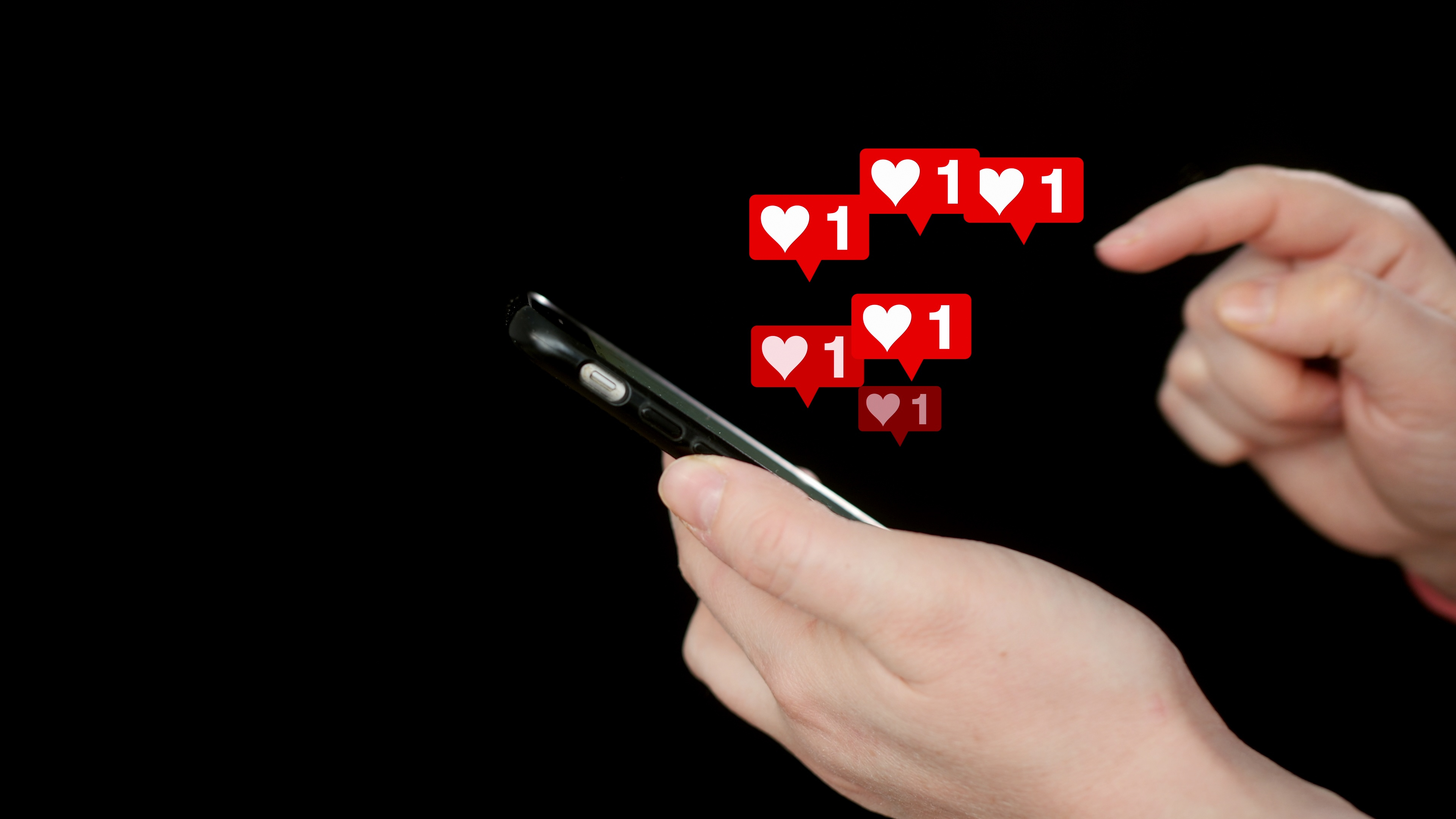 Phone wiht hand that is liking content